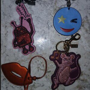 COACH Set of 4 Miscellaneous Bag Charms/Key Chains.